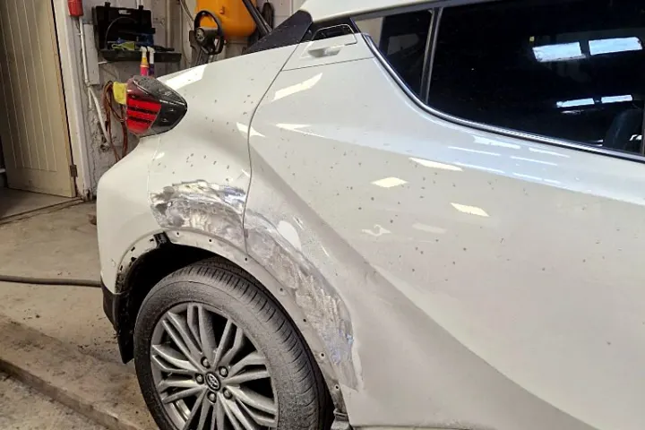 Rear quarter and wheel arch damage on arrival at NG Crash Repairs, Finglas