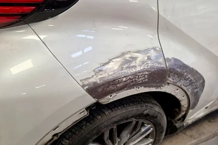 Scraped rear wheel arch at NG Crash Repairs, Finglas