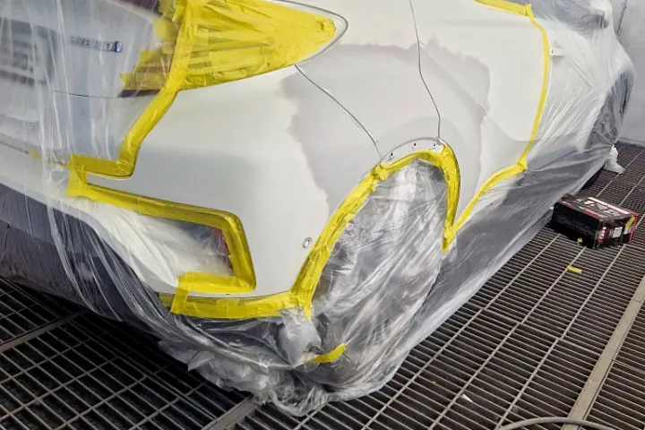Rear quarter painted and masked in the booth at NG Crash Repairs, Finglas