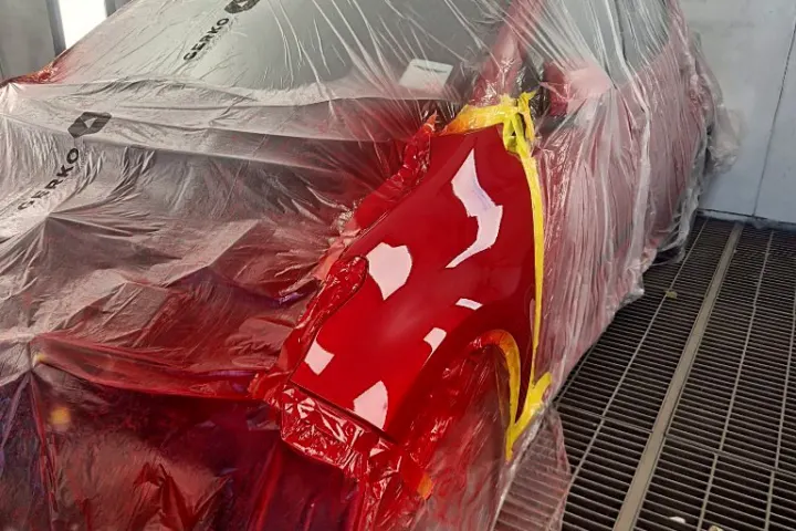 Red wing masked in the booth at NG Crash Repairs, Finglas