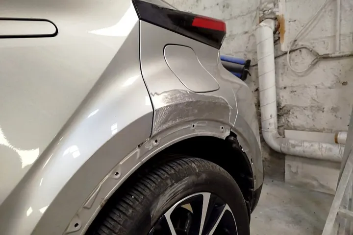 Rear wheel arch damage before repair at NG Crash Repairs, Finglas