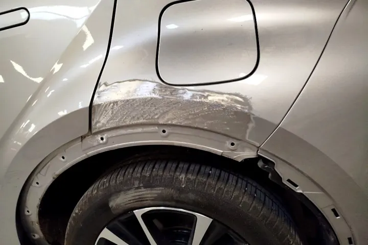 Rear arch damage before repair at NG Crash Repairs, Finglas