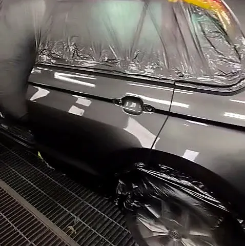 Finished paintwork under the booth lights at NG Crash Repairs, Finglas