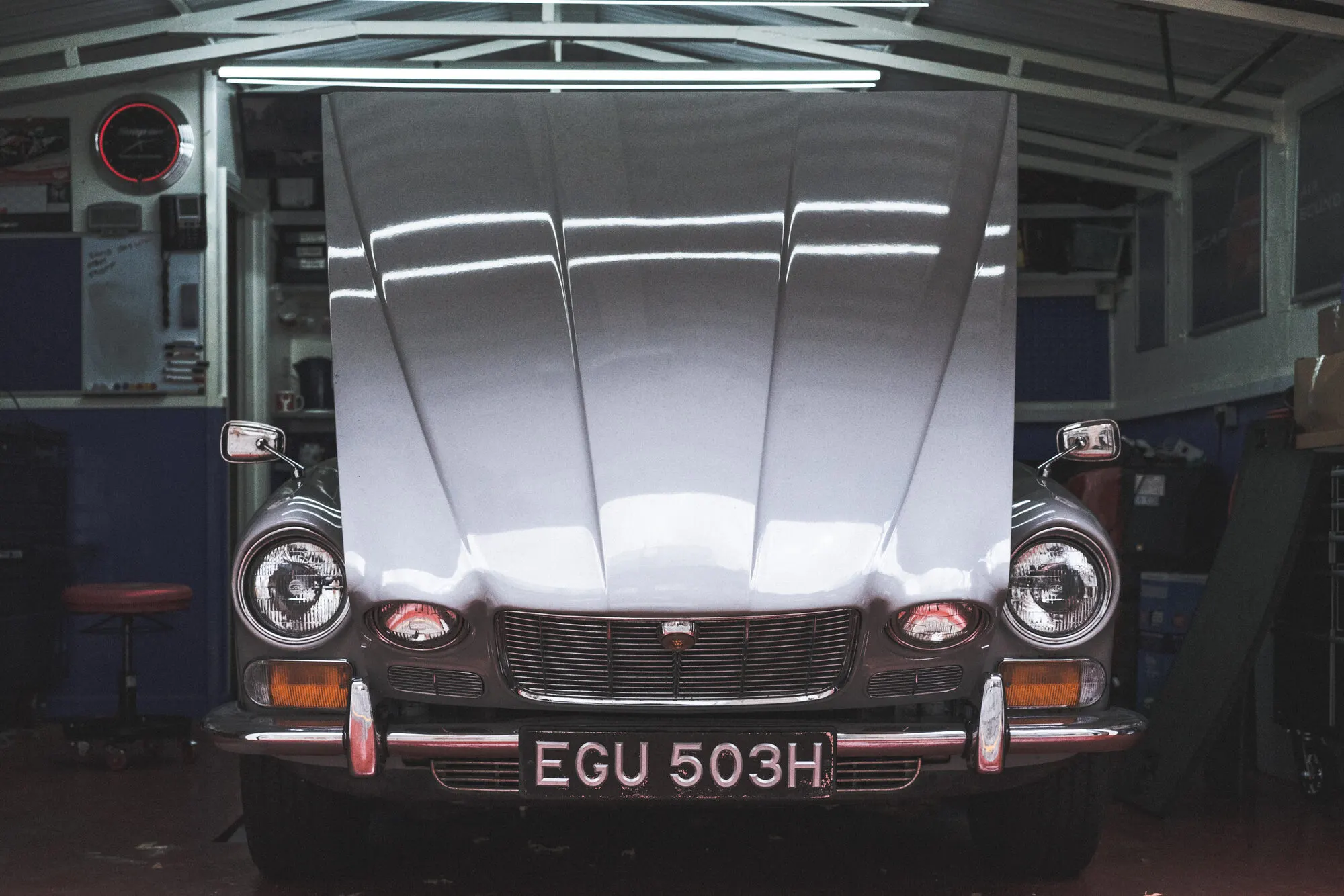 Insurance repair Dublin: car with bonnet open in a repair workshop for assessment